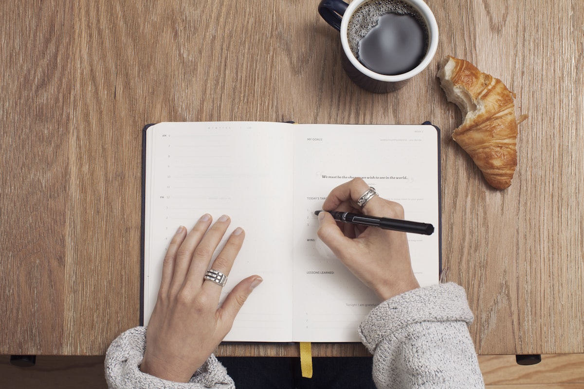 A writer developing ideas and messages at a desk